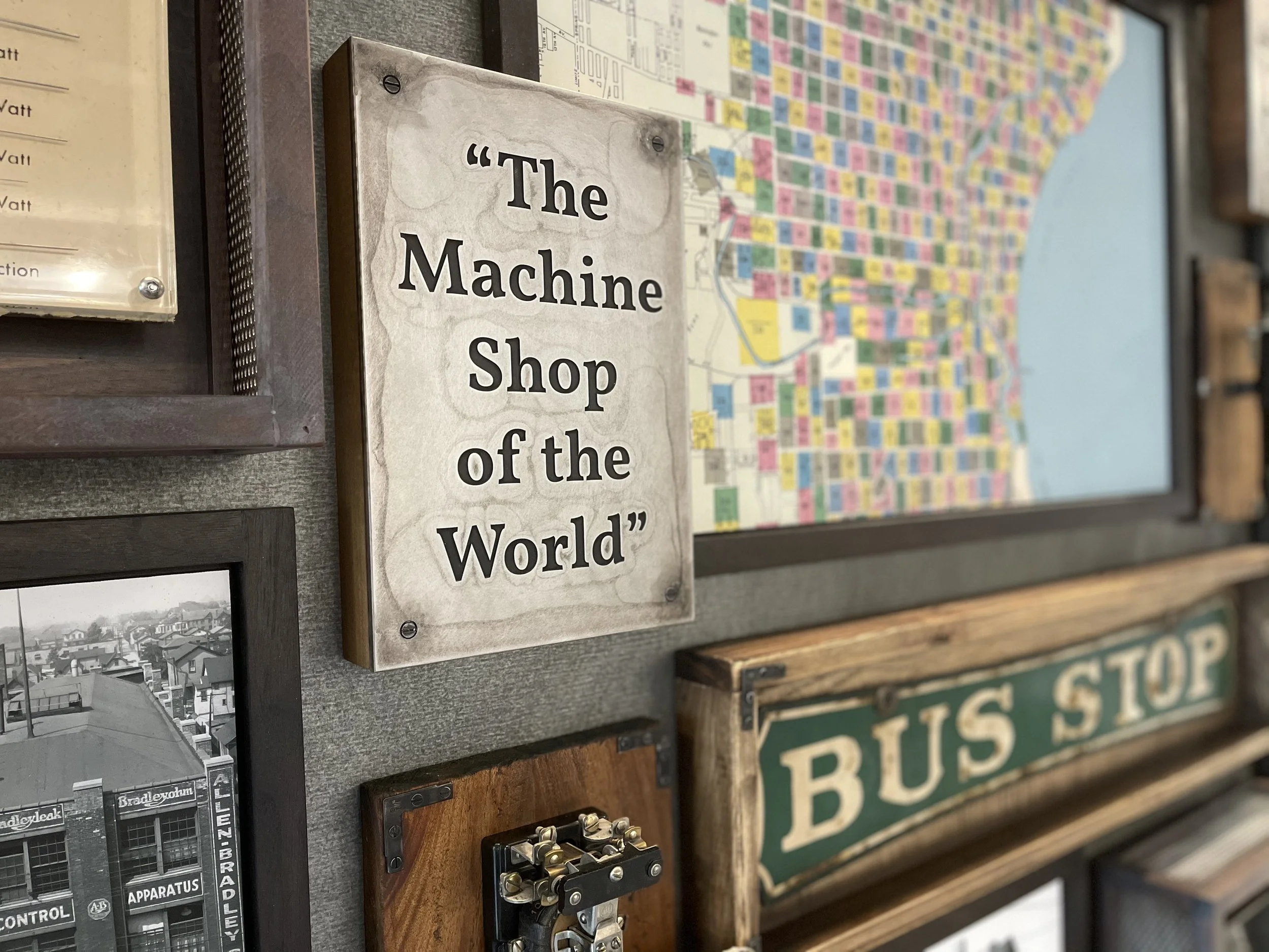 Custom history and storytelling display featuring archival imagery, graphics, and dimensional elements.