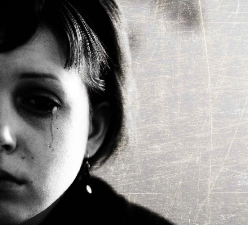 "Sadness" by Sasha Wolff from Grand Rapids - Sadness 90/365. Licensed under CC BY 2.0 via Wikimedia Commons 
