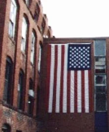 In the days after the attacks, on my daily walk, I sidetracked to the plant whose ancestors made the first American fabrics, using the little waterfall I could hear from my home, to power the mill. I suggested to the mill's office receptionist that we make a flag and share it on the building - just dazed and determined - and they did it....my proudest art yet, I guess! It hung there until it frayed, lit at night by the Amerbelle Mill, now sold on to developers. Heart. Since those days, it is nice to see that the flag spirit has remained. We are one bit better at least.