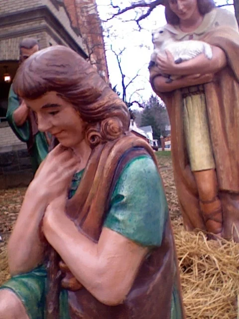 Kneeling shepherd