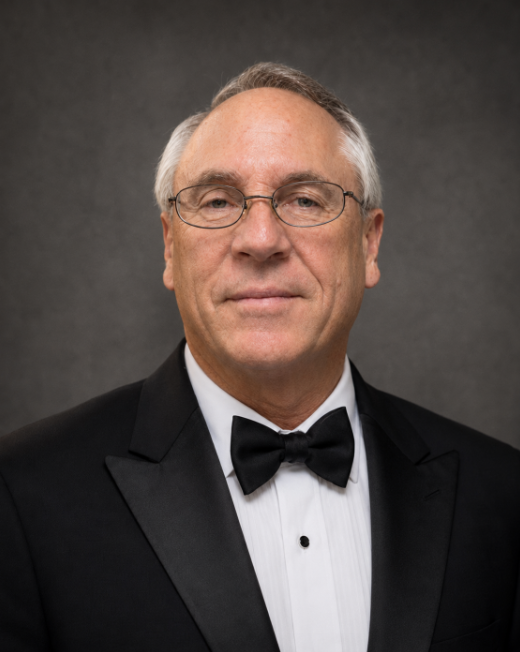 Carl Gray tux headshot.png