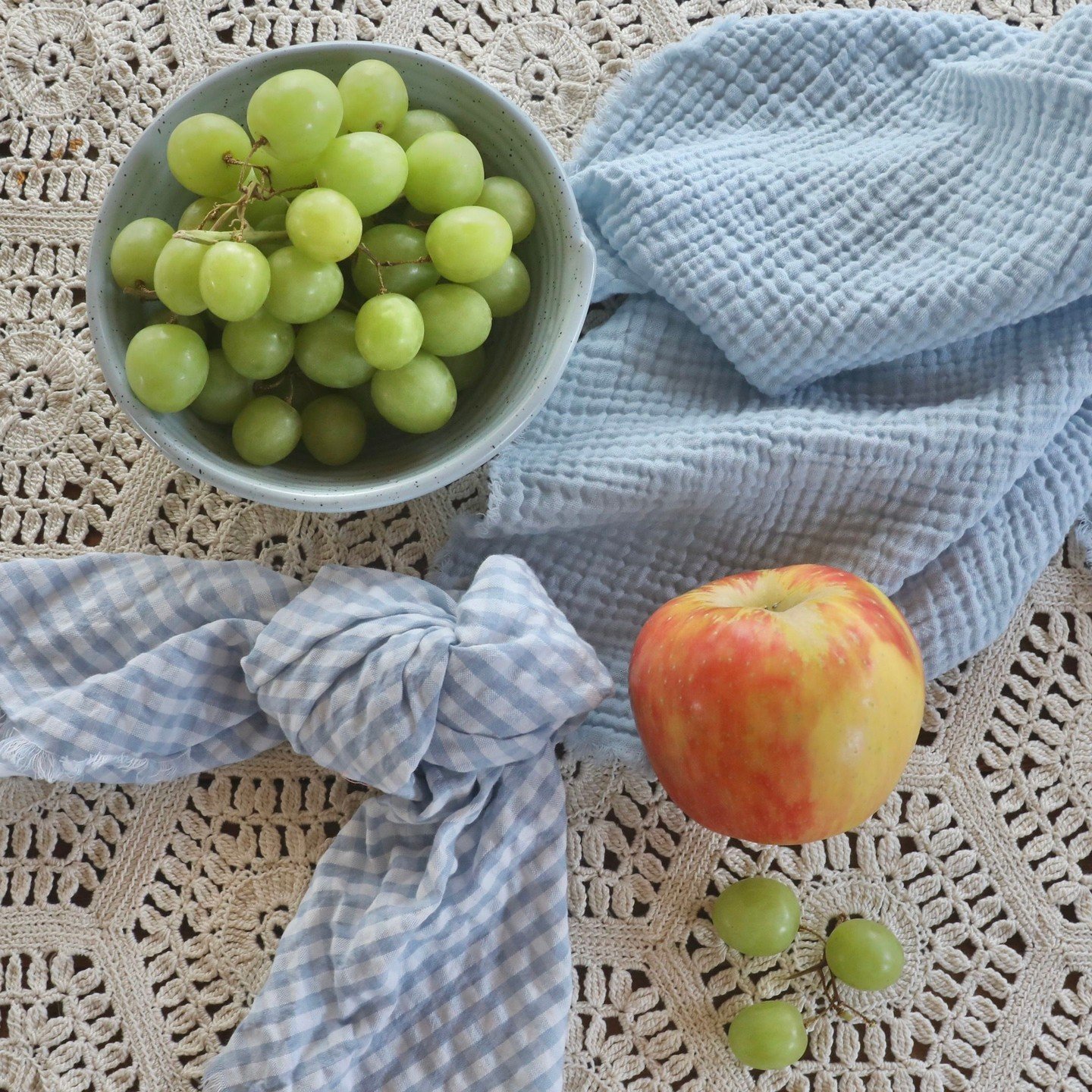 Looking for a way to add spring colors to your dining room? Our handmade seersucker napkins come in peach, peach check, blue, and blue check - perfect for brightening up any table. Plus, they're made with 100% cotton, so they're not only stylish, but