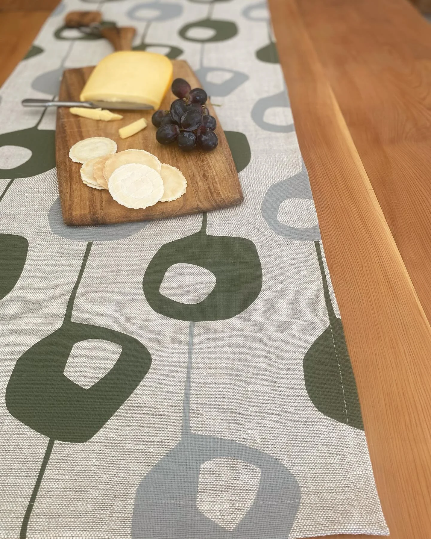The bold and playful Pod design available now on line in green and mud, featuring on linen table runners and cushions. 

#homeaccessories #interiordecor #tablelinen #printed #linen #handscreenprinted