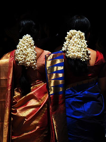 The gajra is a time honoured Indian tradition. Adorning the hair of the Indian lady, traditionally gajras are made from or contain jasmine as they are regarded as the most beautiful and fragrant of India's native flowers. The most common reason that this custom exists is that it represents auspiciousness and prosperity. However, it is likely that it started off as a way of natural perfuming the hair as the scent of jasmine releases feel-good chemicals in the brain.