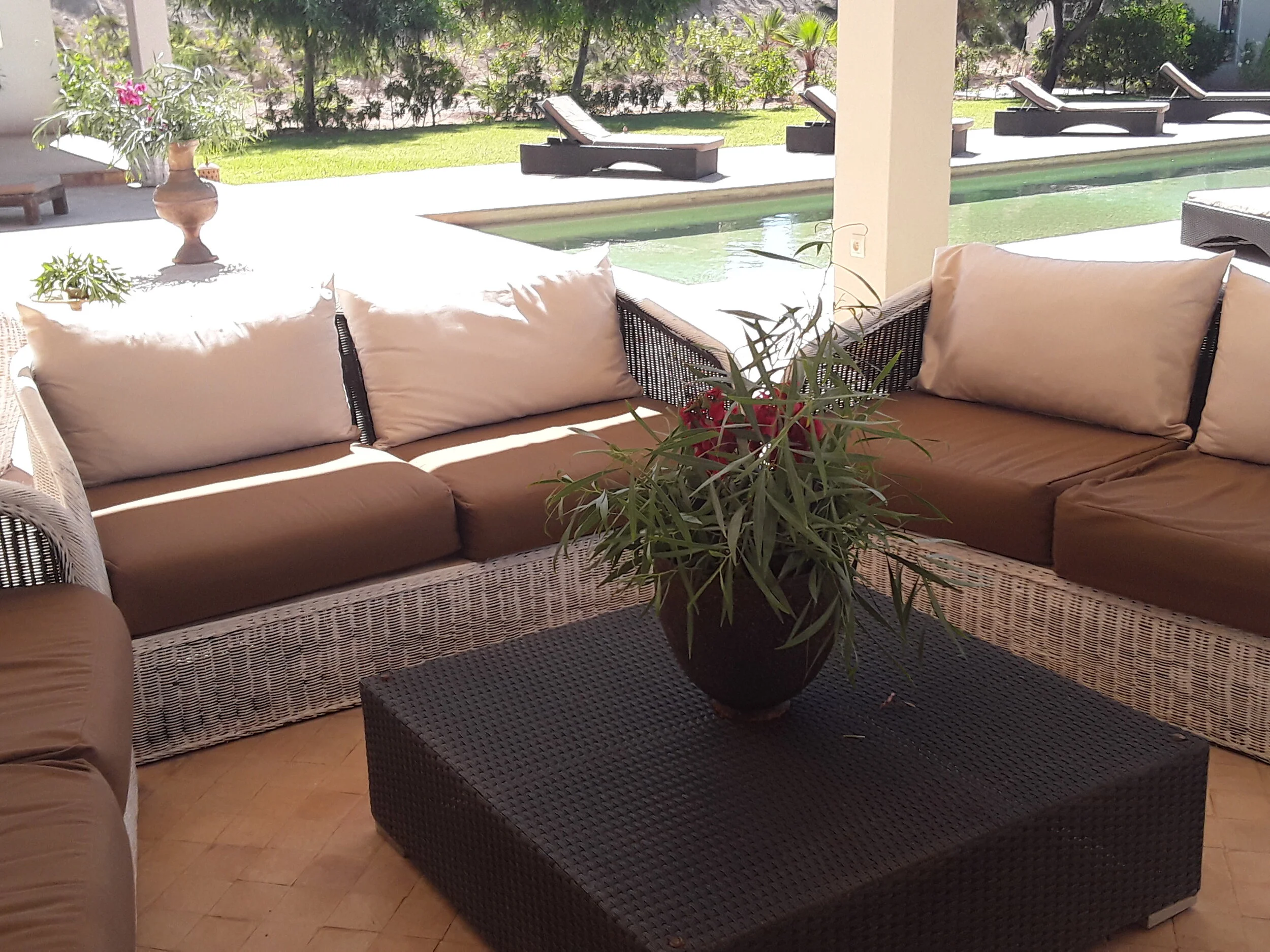 Capaldi hotel Covered lounge area Villa palm.jpg