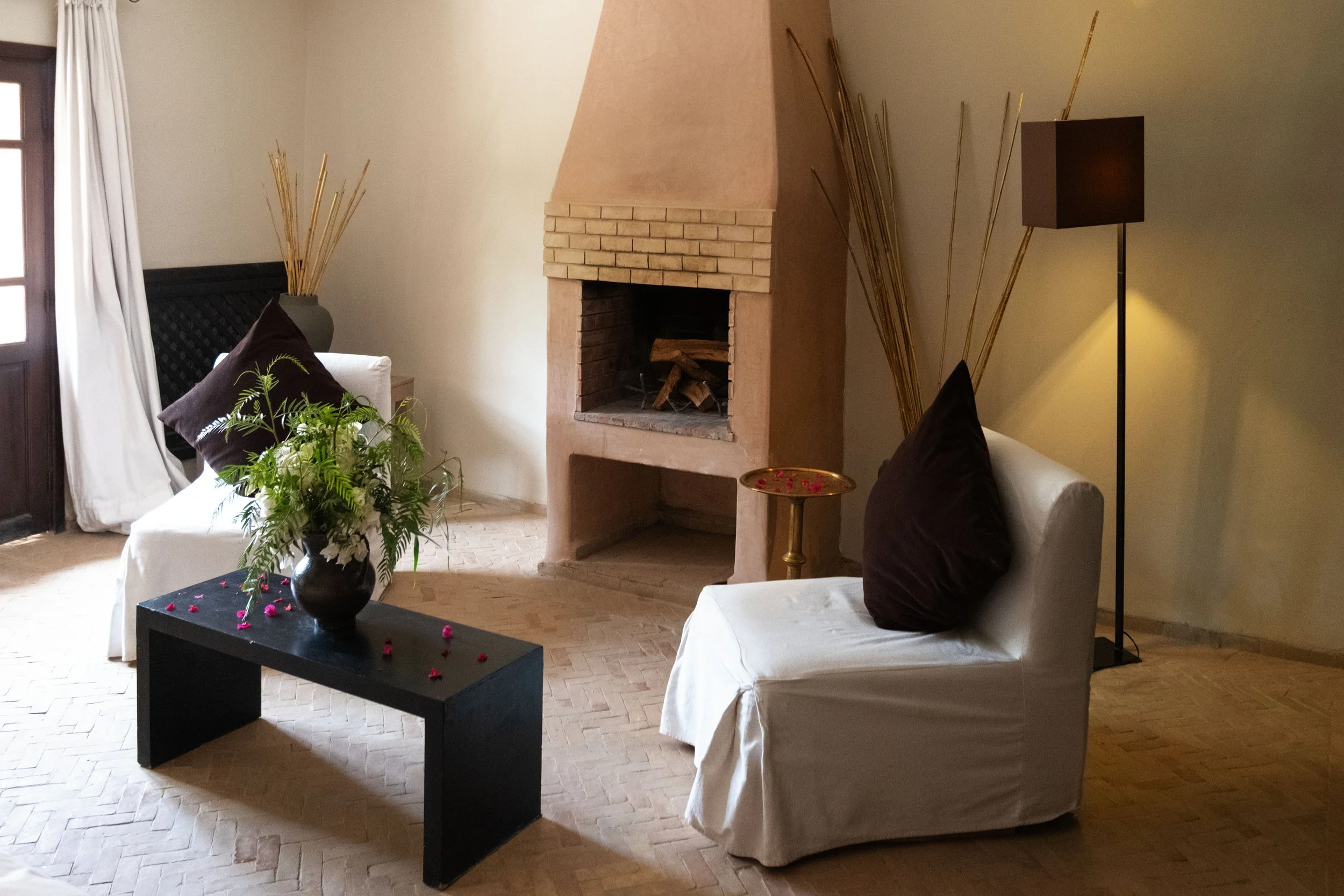 Farmhouse with terrace fireplace lounge Capaldi hotel.jpg