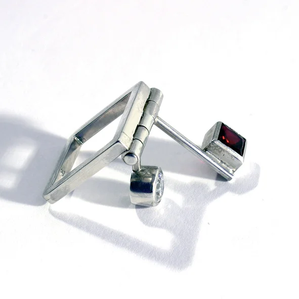 Ring signed by DS, sterling silver, garnet, white sapphire - construction