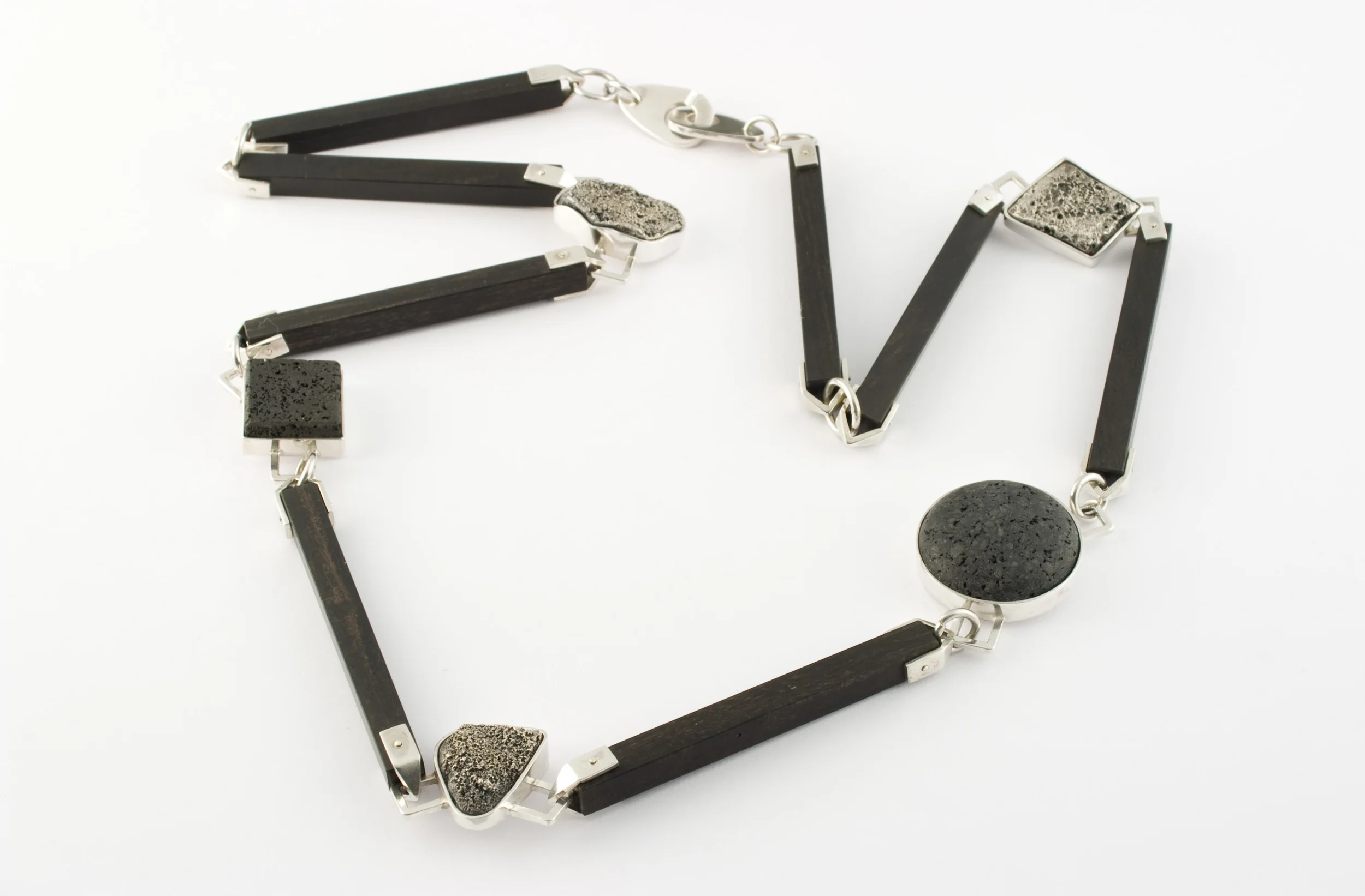 Necklace signed by DS, sterling silver, lava, ebony, nugget stone - construction