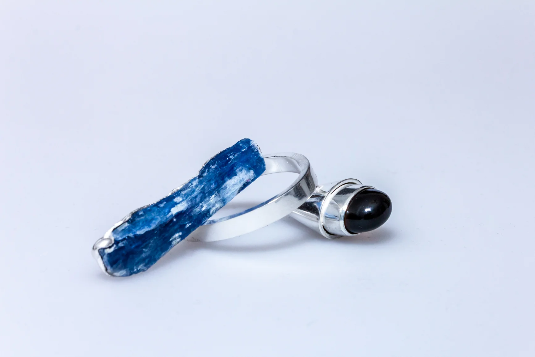 Ring signed by DS, sterling silver, kyanite, smokey quartz - casting, construction.