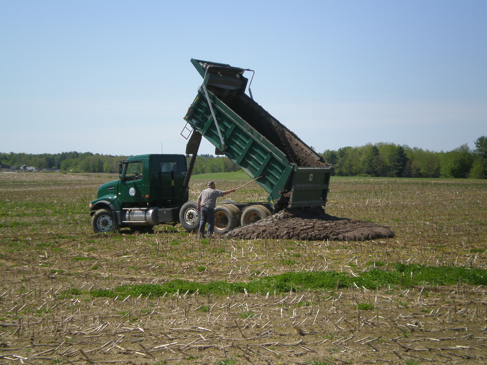  Delivering Class B biosolids to corn field, Quebec. 
