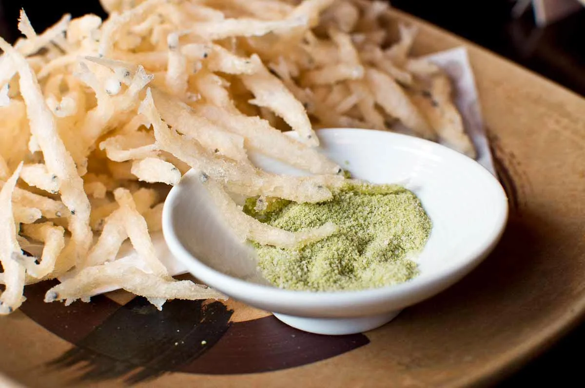 Deep-fried tiny silver fish with green tea powder and sea salt and grilled chicken liver at Yakitori Totto
