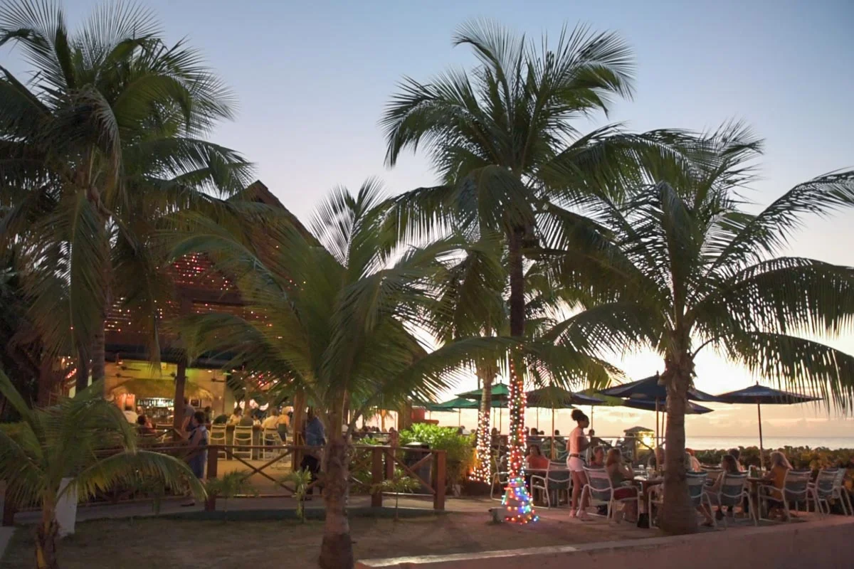 Watch the sunset and drink a cocktail at Sunset House | Photo Credit: ©Find. Eat. Drink.
