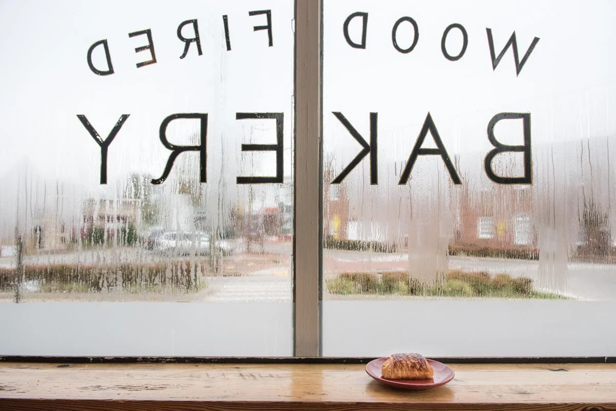 Enjoy a croissant and window view at Sub Rosa Bakery | Photo Credit: ©Find. Eat. Drink.