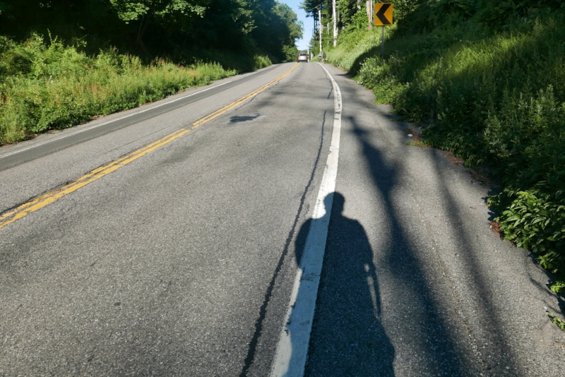 Long shadowson the moring ride out of camp