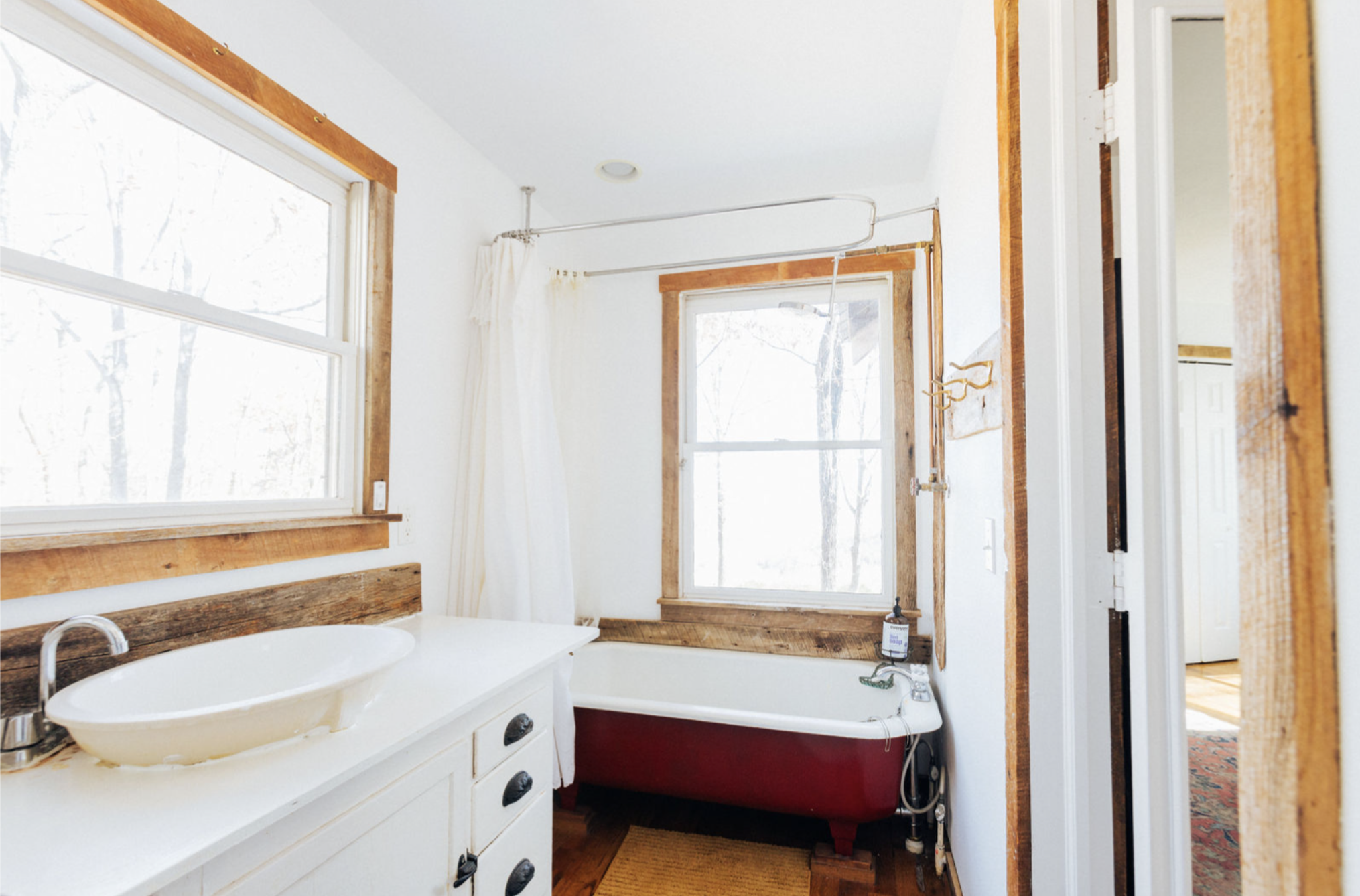 Whispering Falls Private Master Suite bathroom in the Main House at Rising Sun Retreat.