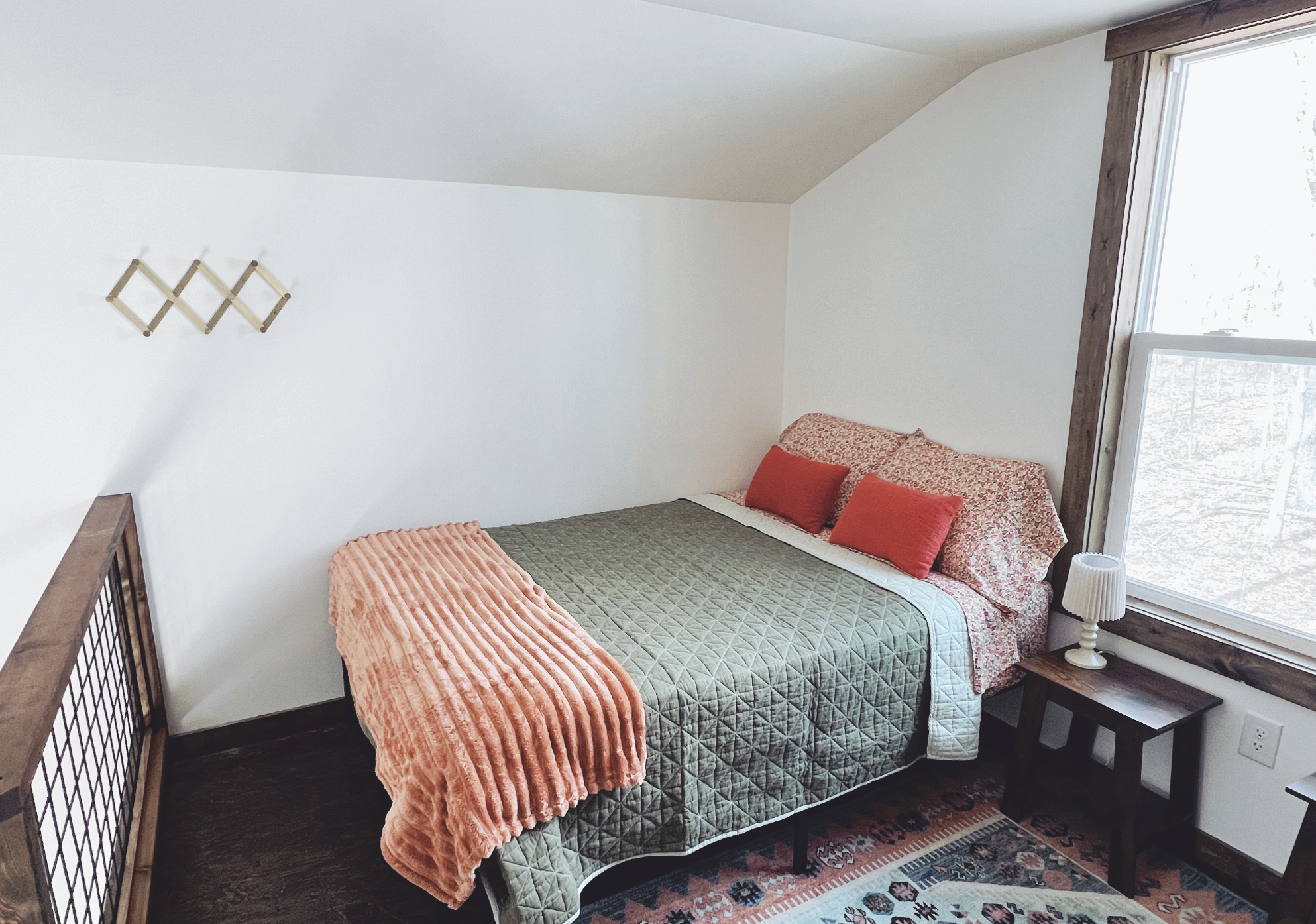 Hideaway Tiny House full bed at Rising Sun Retreat.