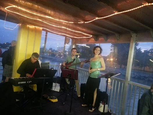  Singing on board the Harbor Town Belle for the Jazz 'N' Wine Cruise. 