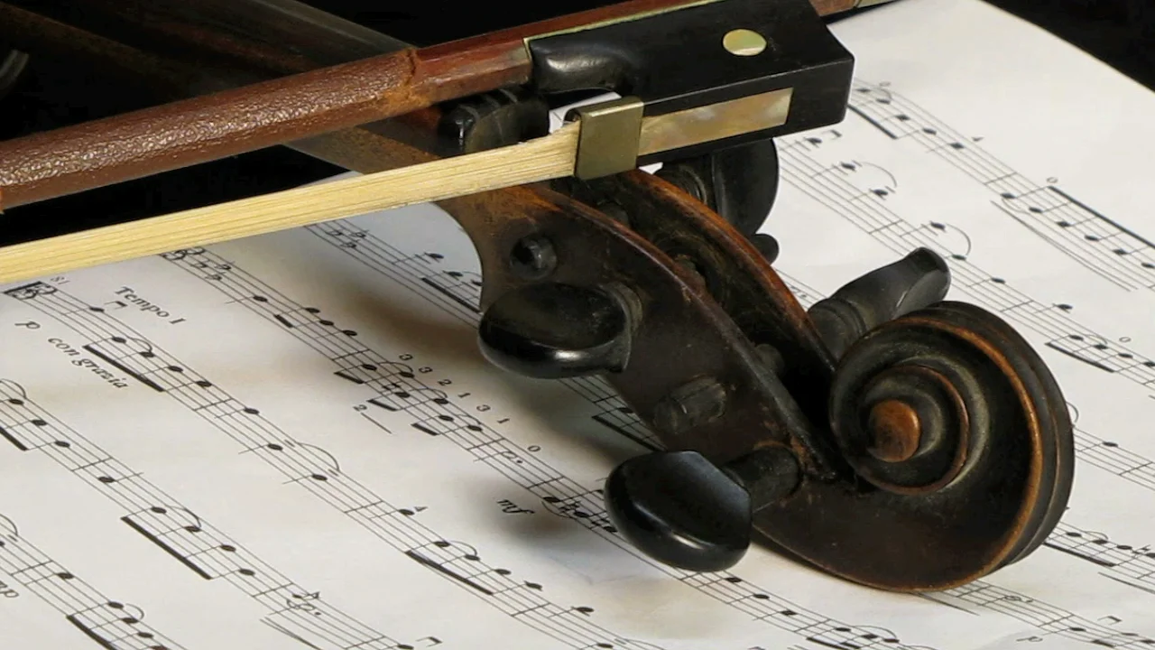 Violin, bow and music.jpeg