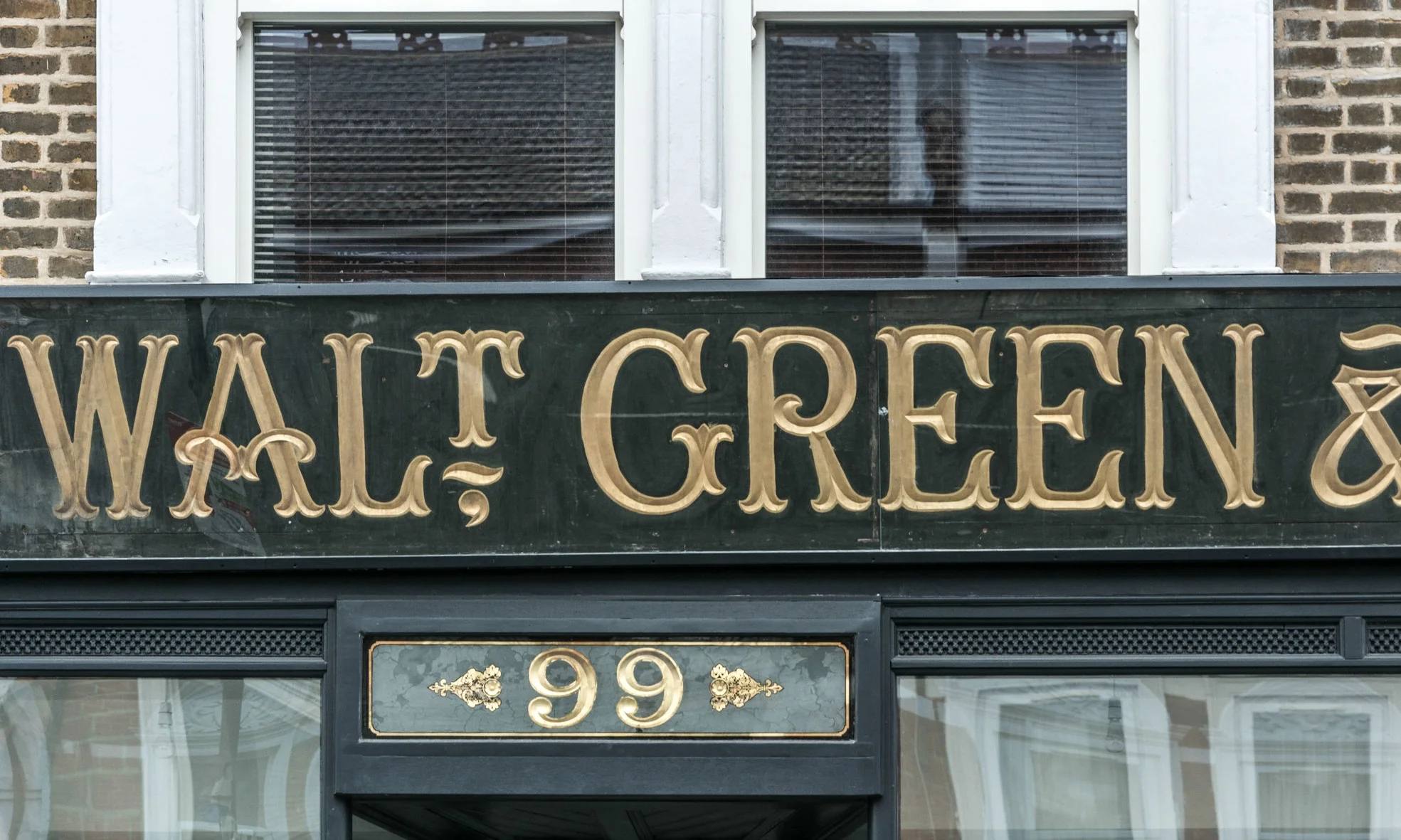 Removing the painted glass shop sign for repair, we found an even older hand carved hardwood sign . A single piece the full width of the frontage with letters picked out in gold, it has now been reinstated as the original shop sign.