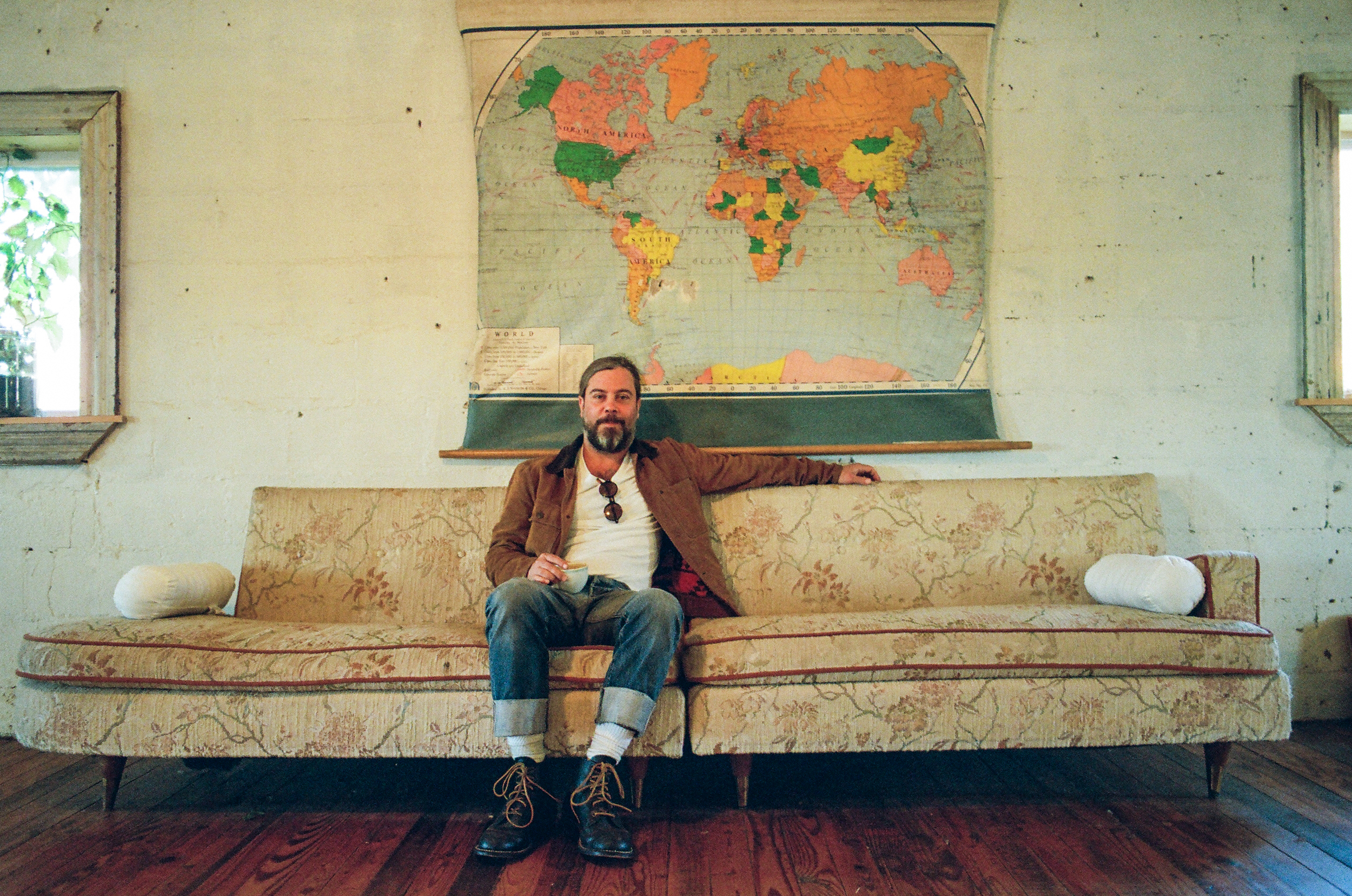 Drew with a cup of his brew at his river house in Nashville.