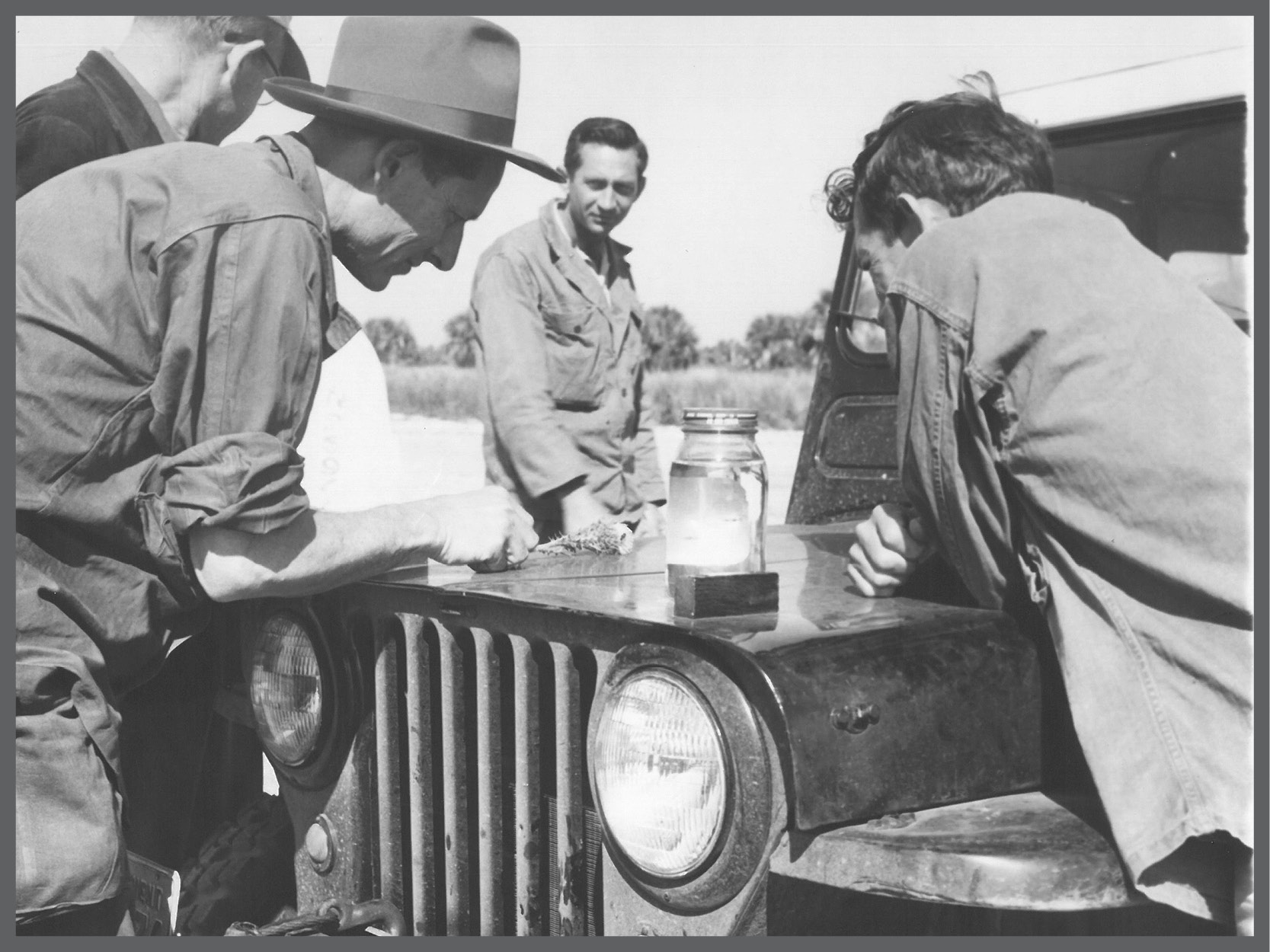 Edward F. Knipling (left) and colleagues doing field research. Photo courtesy of World Food Prize Foundation.