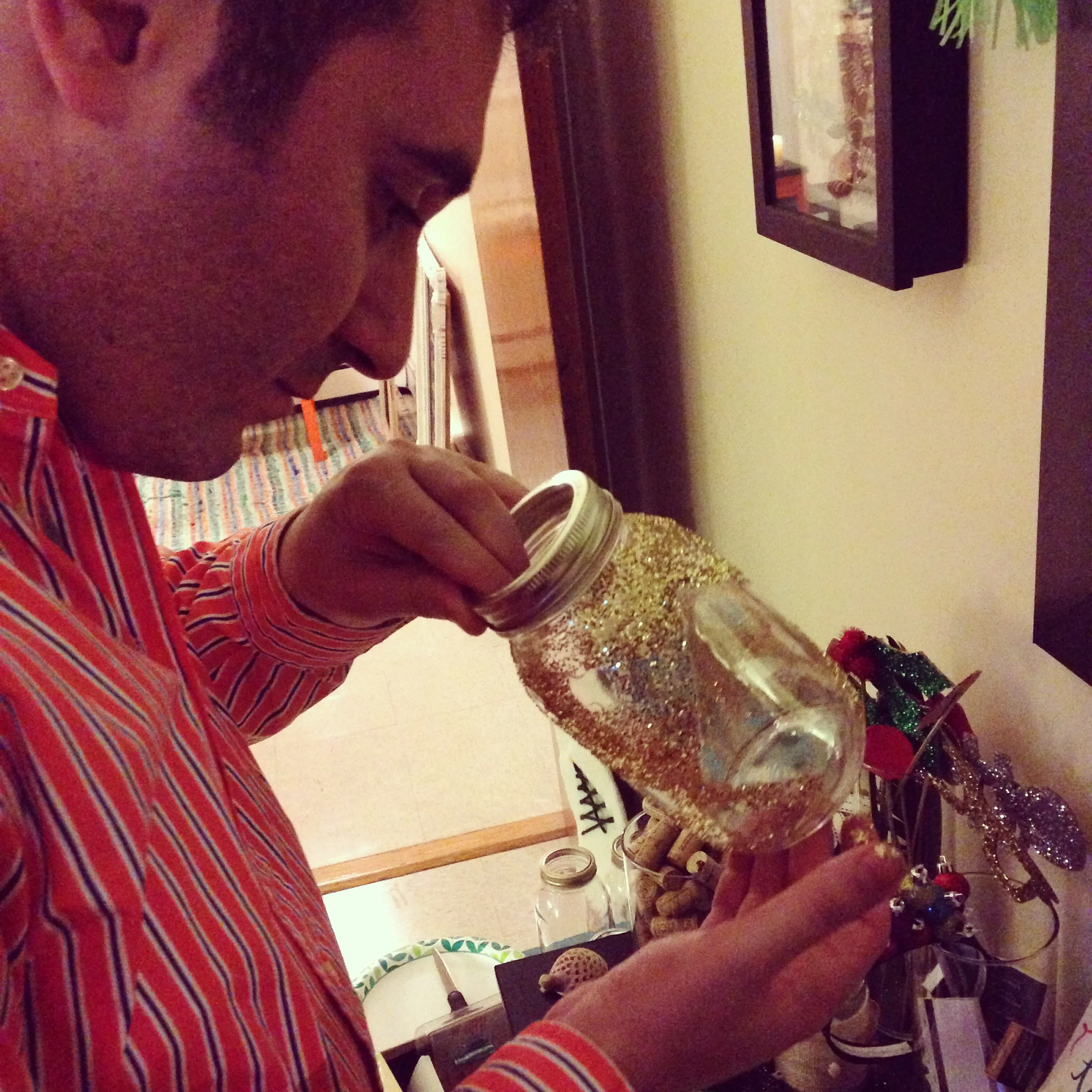 Joe doing his part and making candle holder - so crafty!