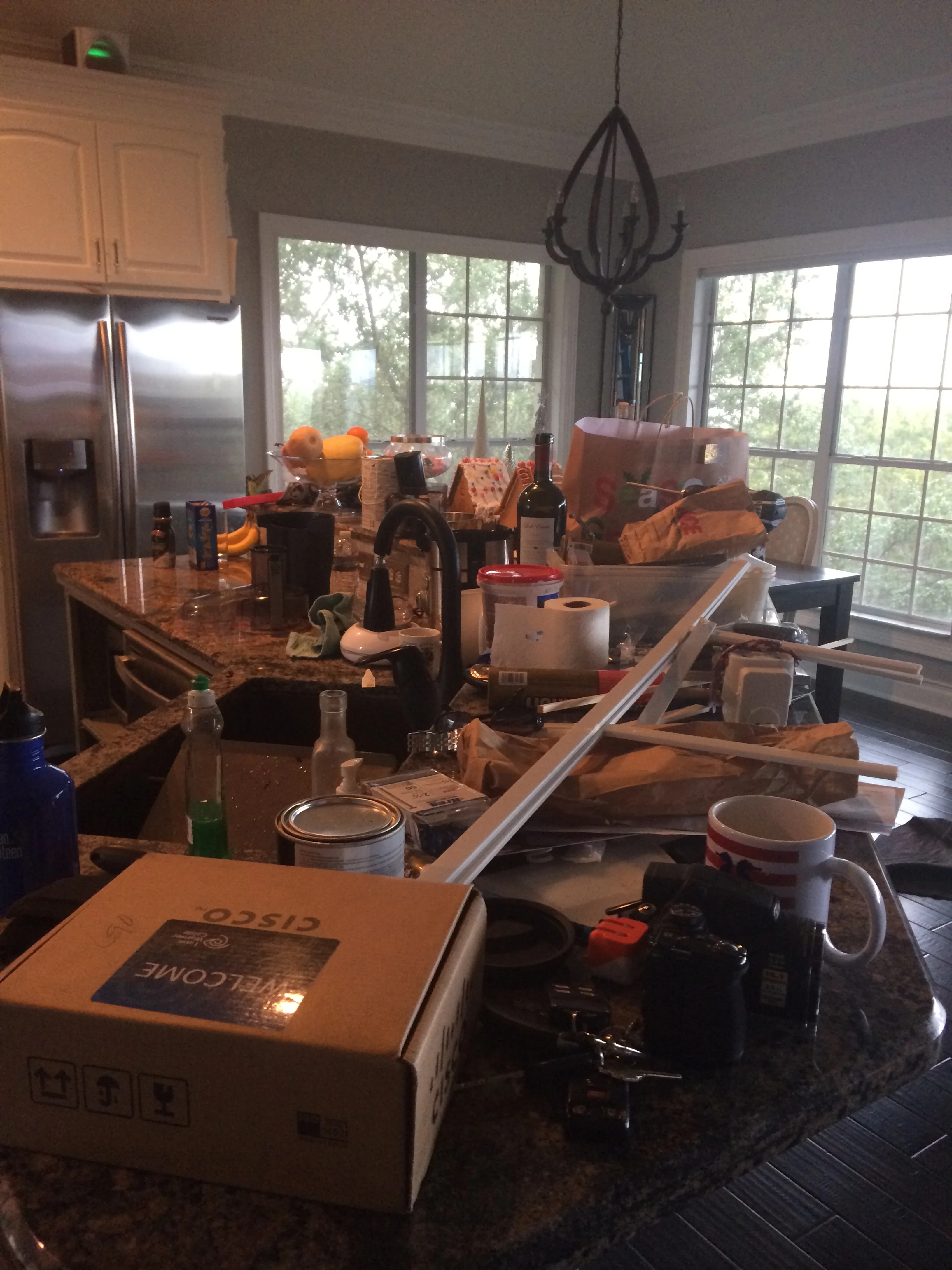 The enormous bar became a daily space for collecting junk. I would love to say this was just because it's the holidays, but really, it's because it's so easy to just sit stuff there.