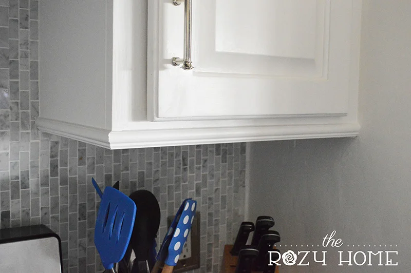 Easy (and Inexpensive) Cabinet Updates: The 15 Minute Fix (Adding Trim to the Bottom of Cabinets)
