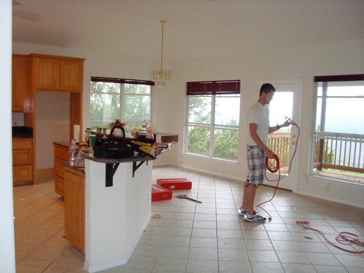 A pic from when we actually moved in and my baby brother came over to help demo all of that tile.