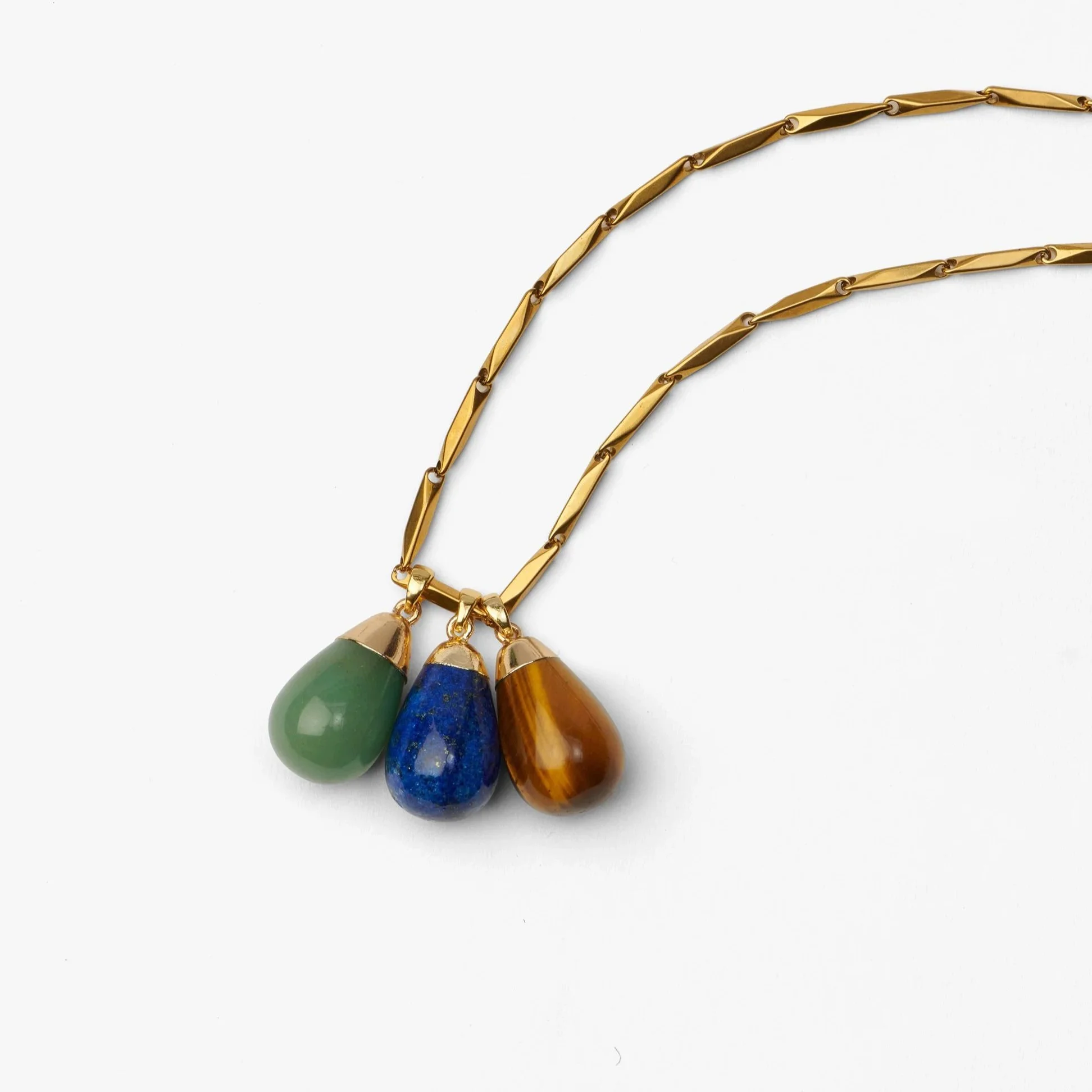 Palm+Shade+%E2%80%94+Triple+Stone+Necklace+Style.jpg
