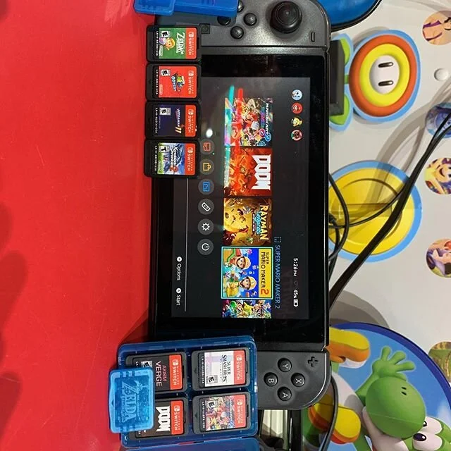 New/Used great condition and a ton of games and new carrying case!!!