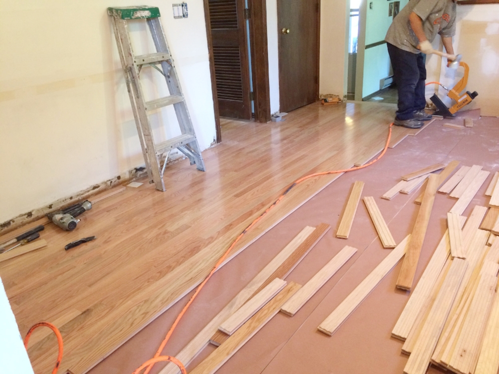 WIP: Red Oak hardwood floors that match the rest of the house was installed prior to the cabinets.