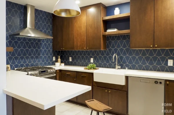 AFTER: There used to be a wall and a fridge where the peninsula is.