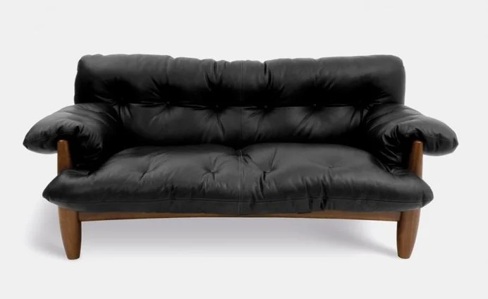 Mole sofa in jacaranda and leather, 1957 ( source )