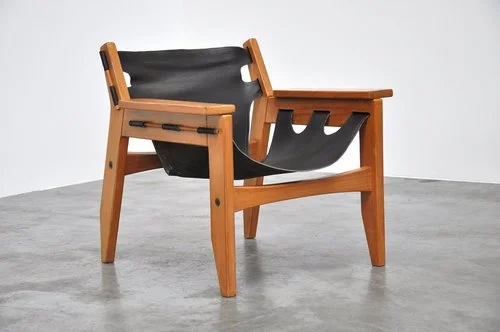 Kilin chair for his firm, Oca Industries, in Brazilian pine and leather, 1973 ( source )