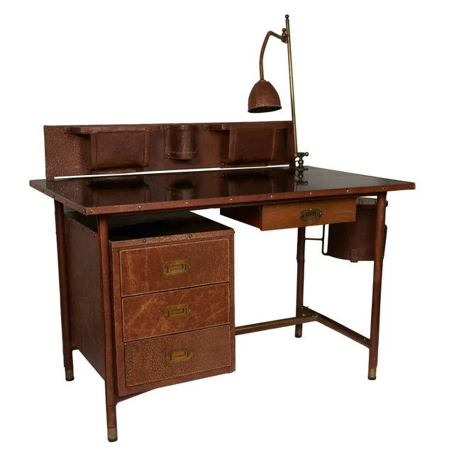 Stitched leather desk, 1950s ( source )