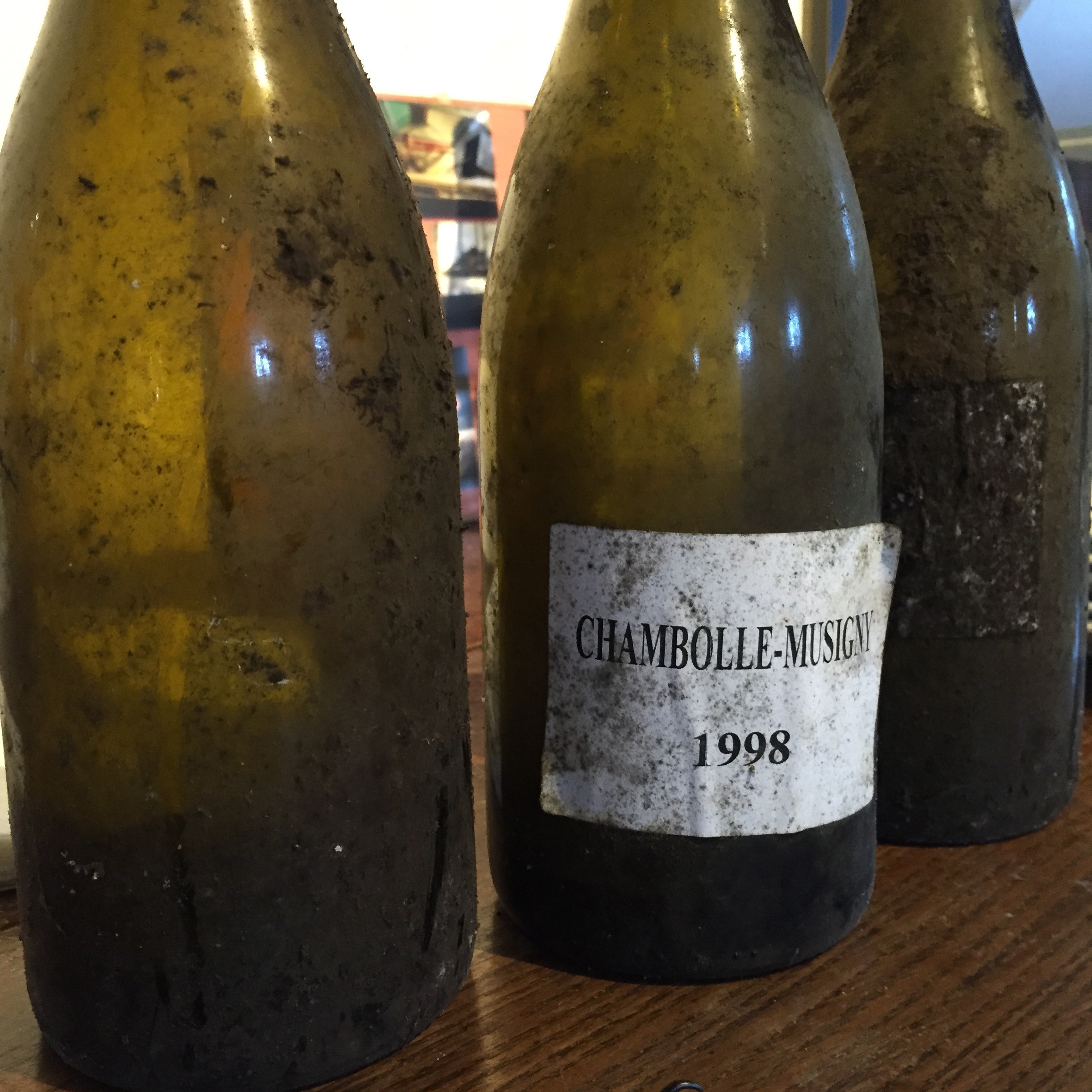 a '98 Chambolle sandwich, between two bottles of '97