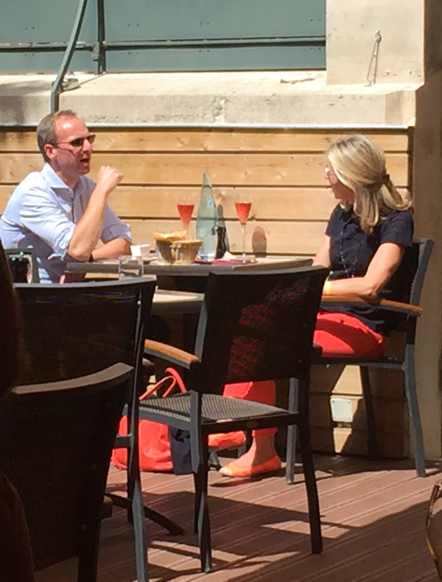 Guests (not in our group) enjoying the sun and some Brut Rosé on the deck at La Banque