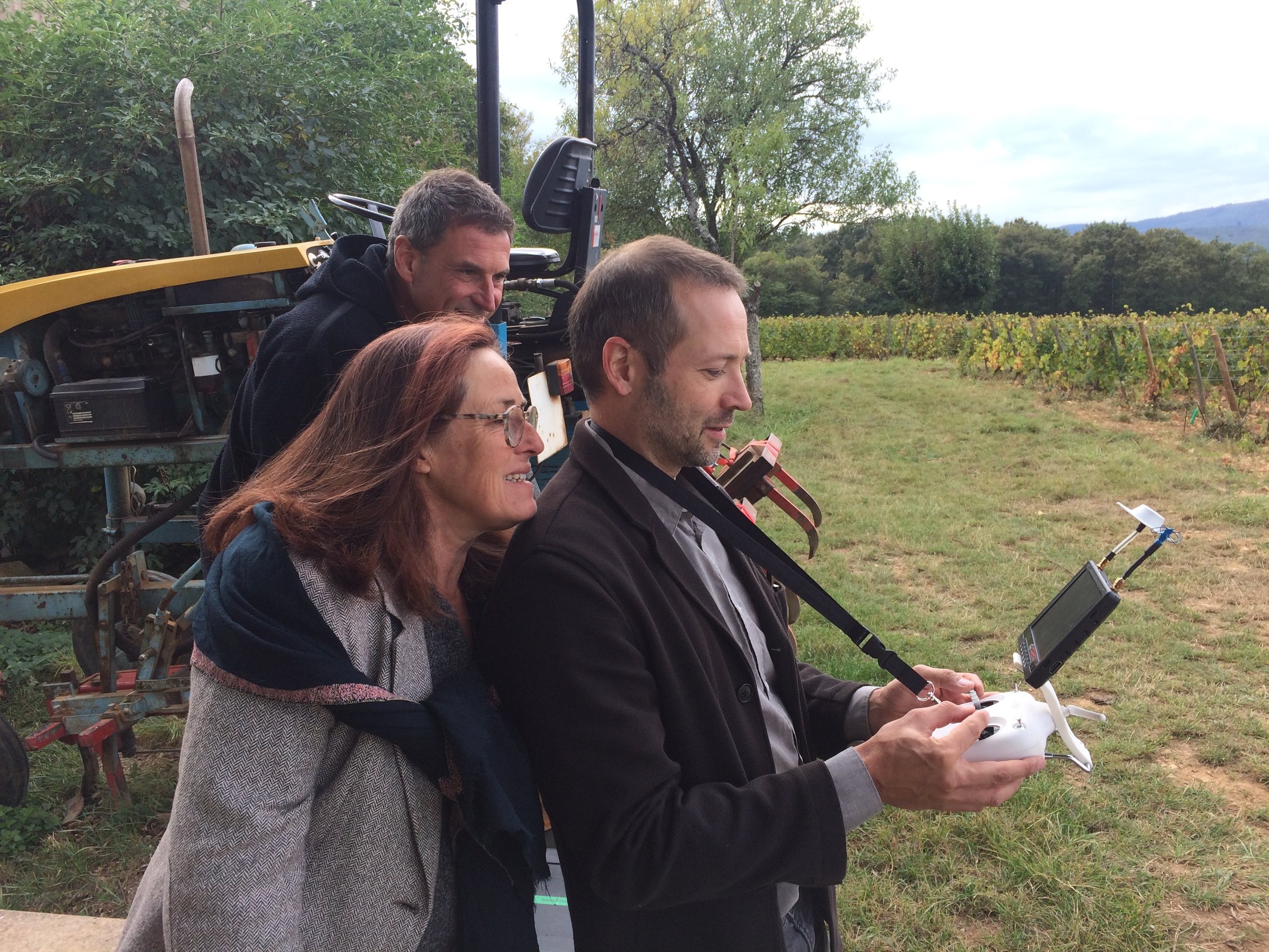 David Baker, flying the drone at Chateau des Rontets , with winemakers Fabio & Claire Gazeau-Montrasi