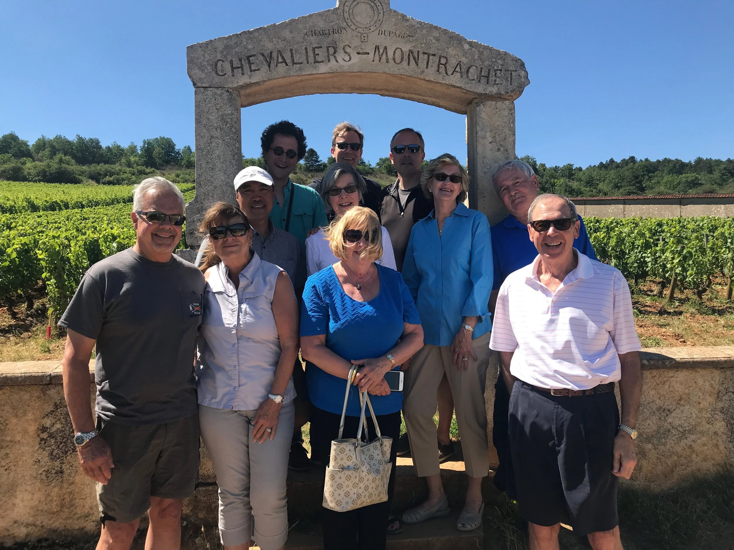 Our annual group shot in the arch at Chevaliers-Montrachet