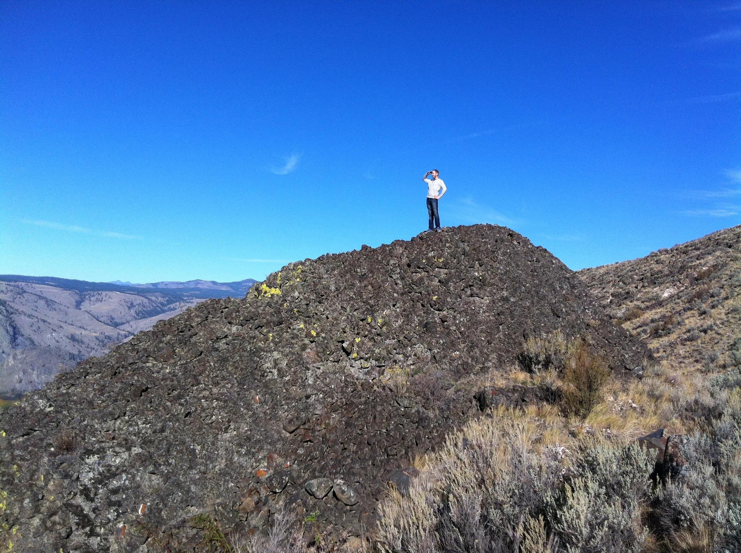 This basalt monolith anchors the Northwest corner of our land and looks to be about half its actual size from the end of the driveway up above. The hillside is so steep we had to zig-zag constantly to avoid slipping and sliding down.