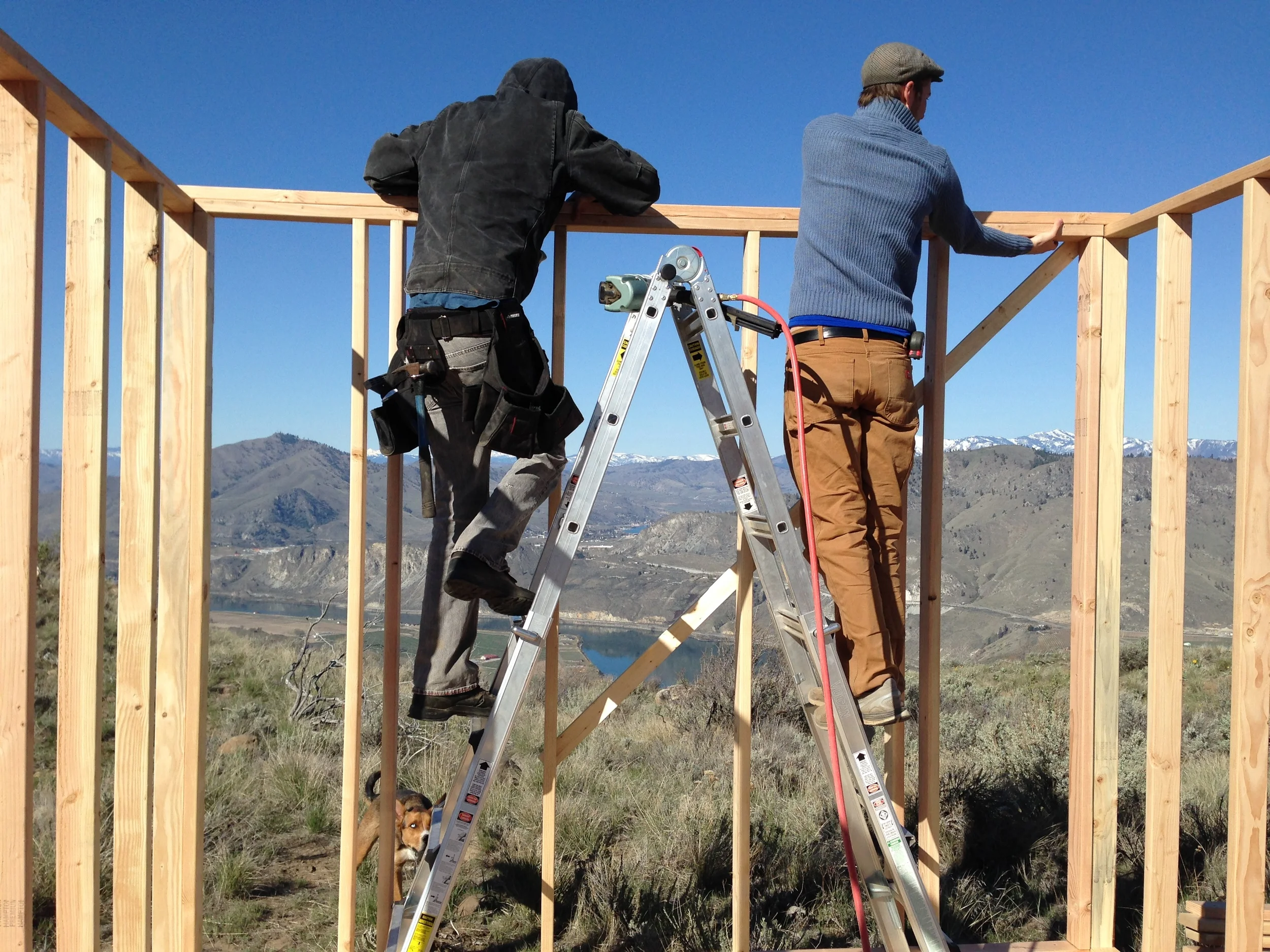 Alex and I adding the second top plate to the framed walls.