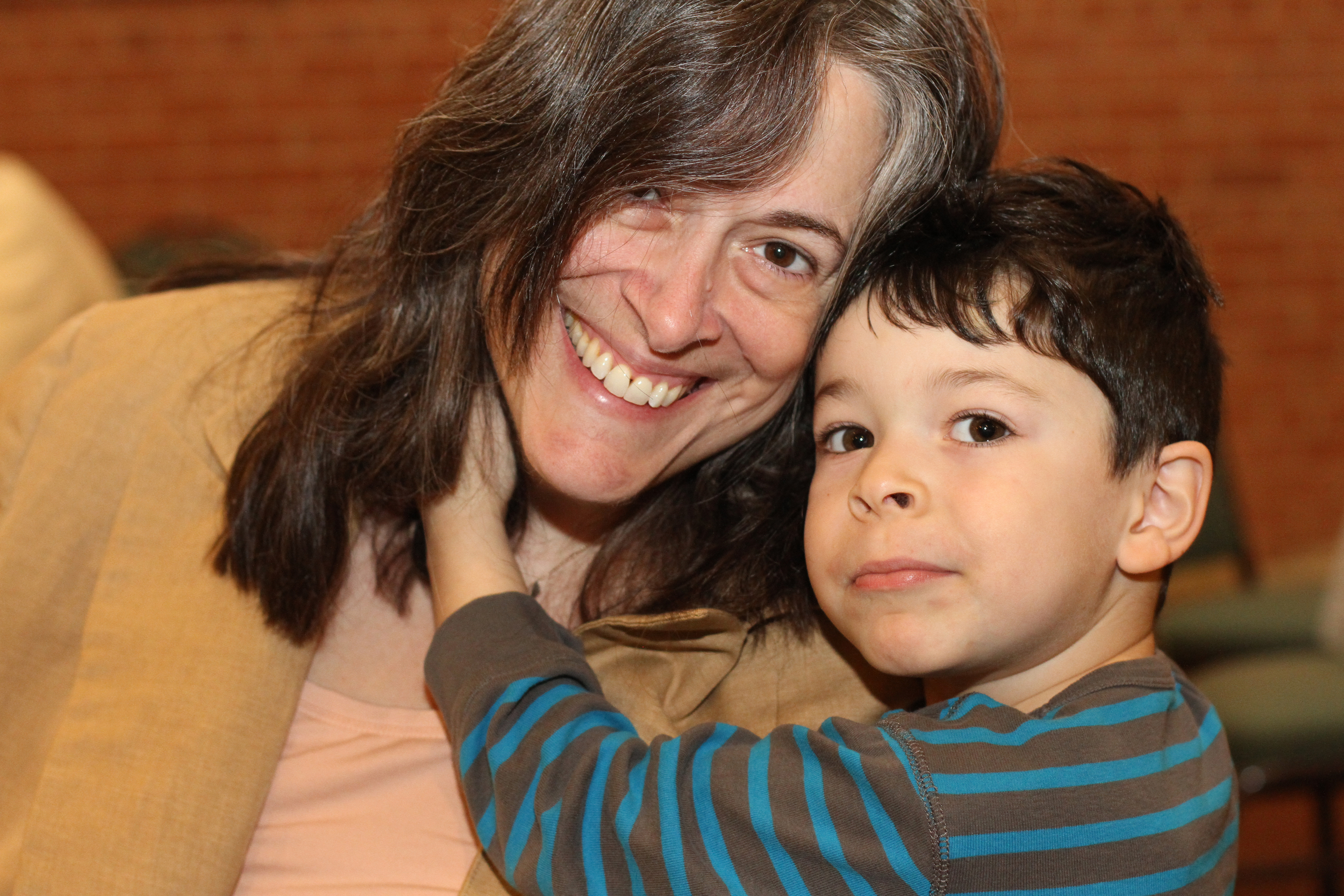 Mother with her son at a Tu B'Shevat seder