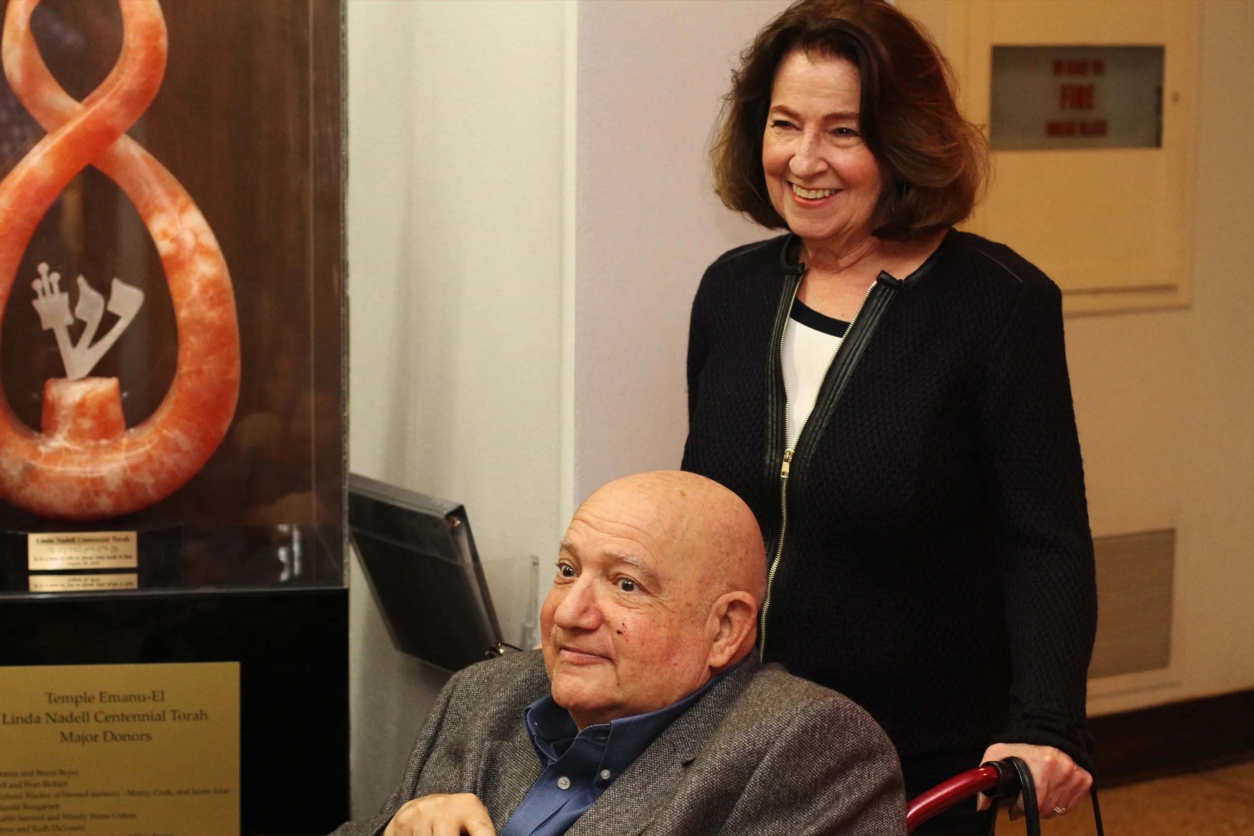 A Torah donor recognition display at Temple Emanu-El