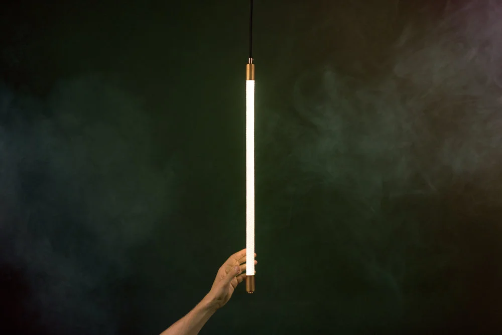 A creative alternative to the standard pendant light, our Tracer Pendant is a simple, elegant light that makes a statement regardless of your project's budget. As pictured: Two Foot Tracer Pendant (Brass Hardware)