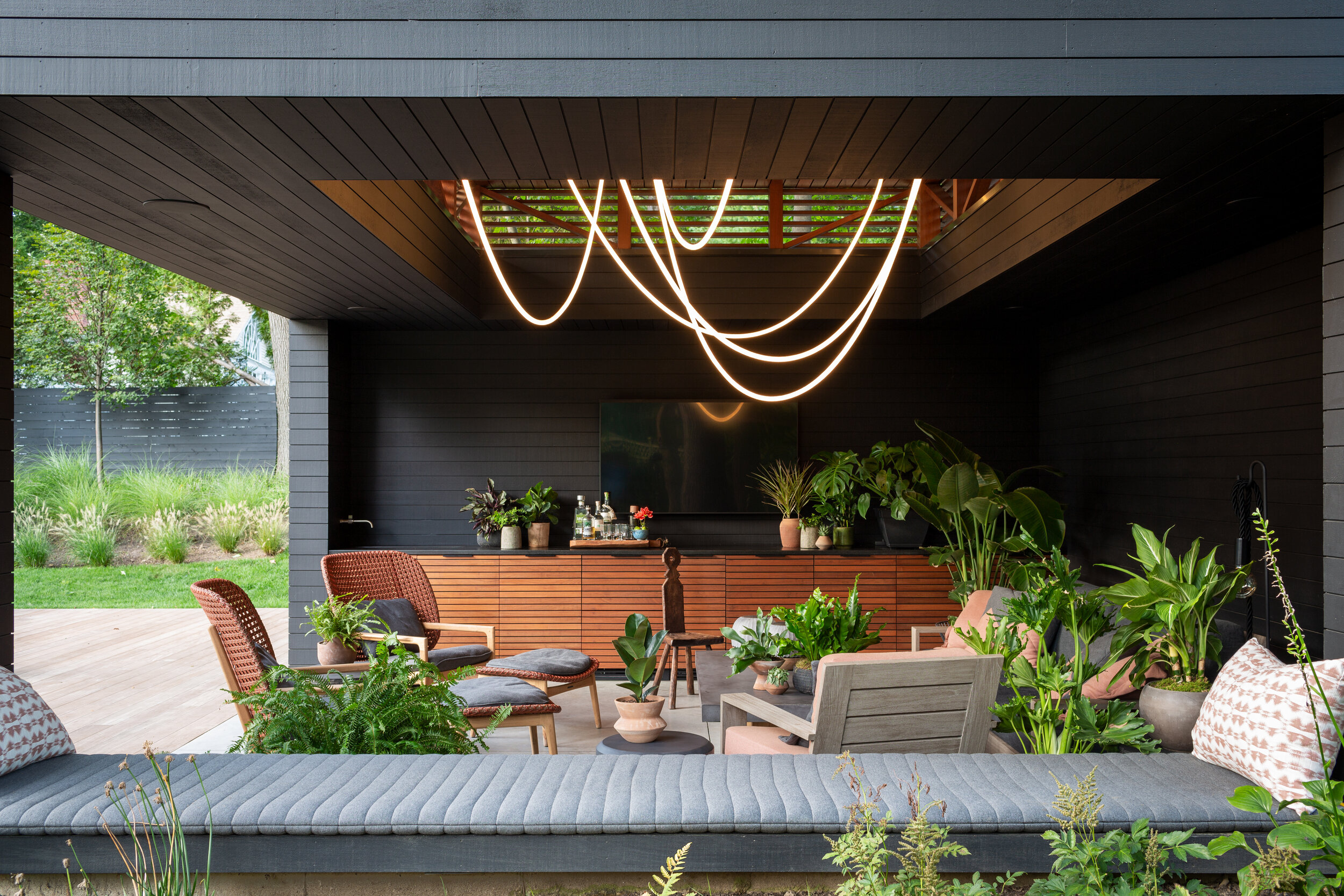  Designer Amy Hirsch unleashing the power of ambiance in this lush poolhouse featuring the  Tracer Loops . Photographed by Amy Vischio. 