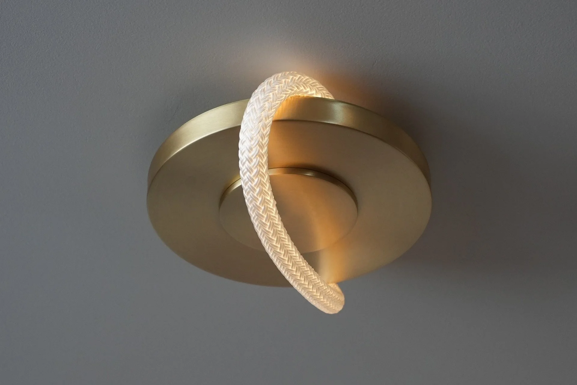 EssexFlushMountLeft-SatinBrass-Ambient-On-Front-8720.jpg