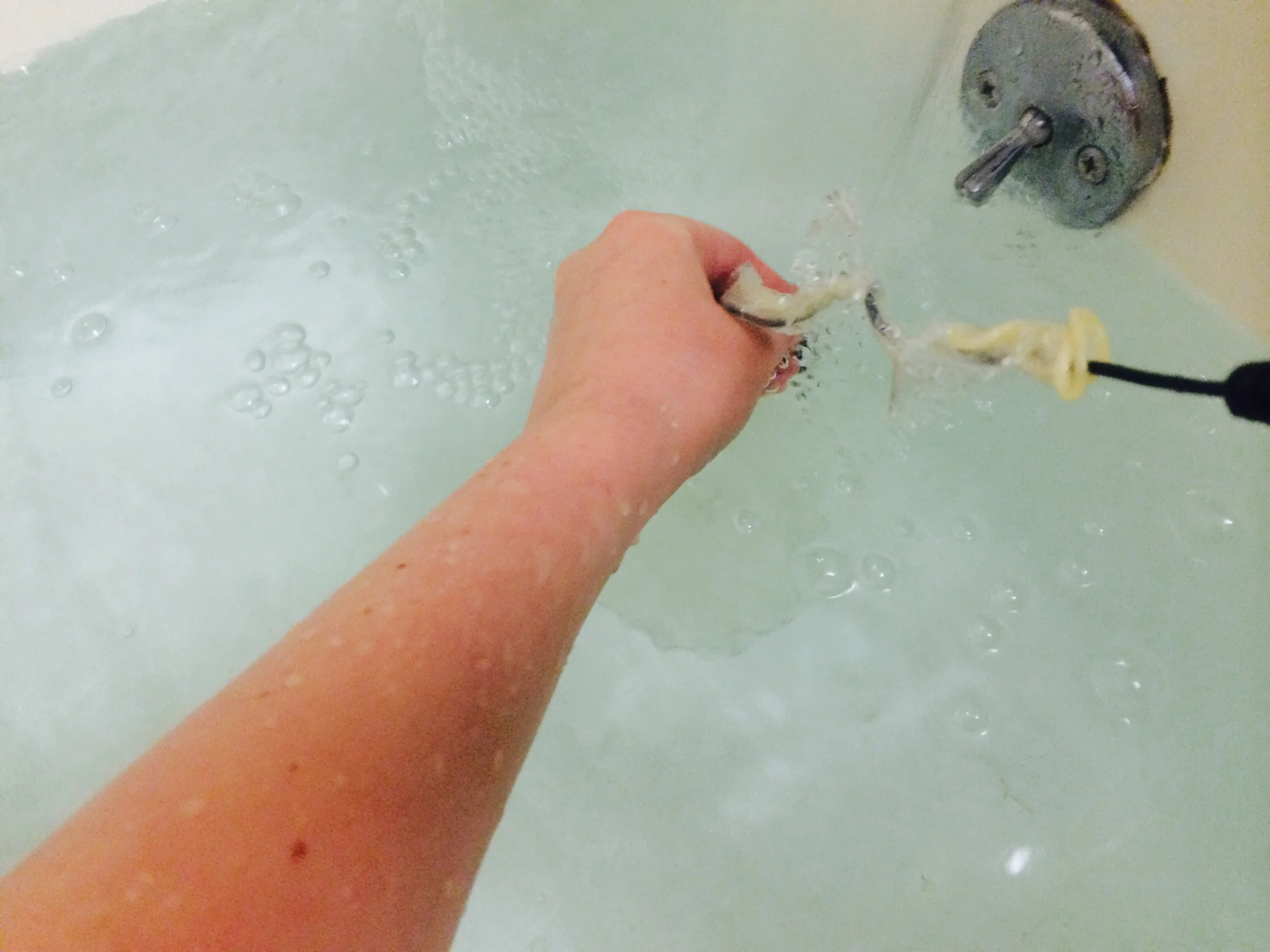 The final recording session in my home bath tub. The angle is not great, but I was trying not to drop my camera, recorder, or the microphone into the water. 