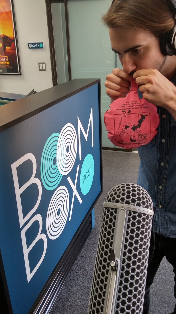 Our newest intern, Evan, helps to record inflating whoopee cushion sounds. 