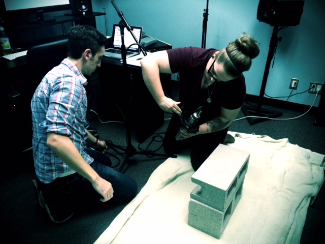 Jessey and Jeff prep to record cinder block scrapes as a key sonic element in skeleton warrior coming to life. 